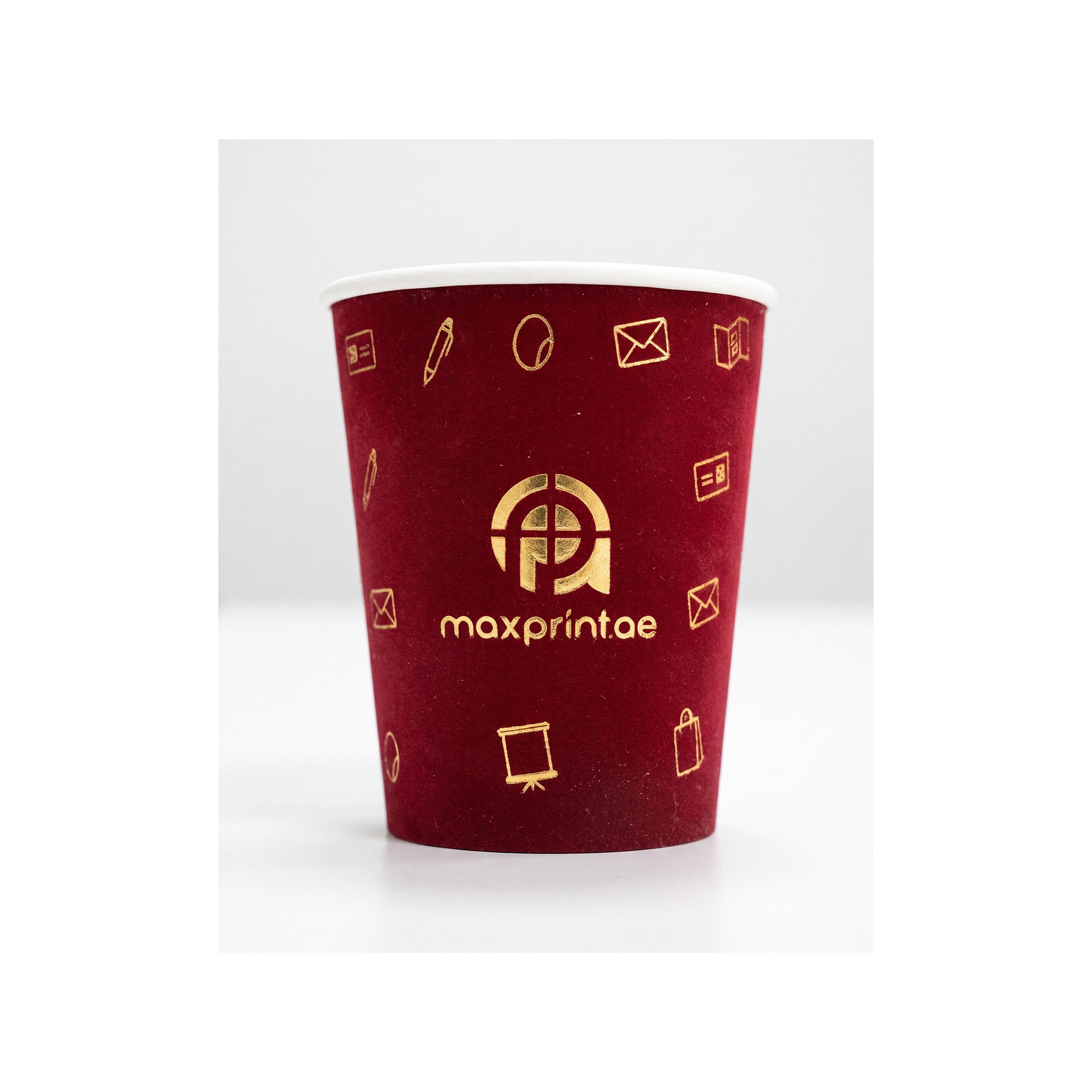 8 oz maroon velvet paper cup with a gold foil logo — MaxPrint Dubai