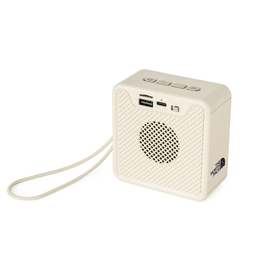 Felix @memorii portable wireless speaker in beige and gold